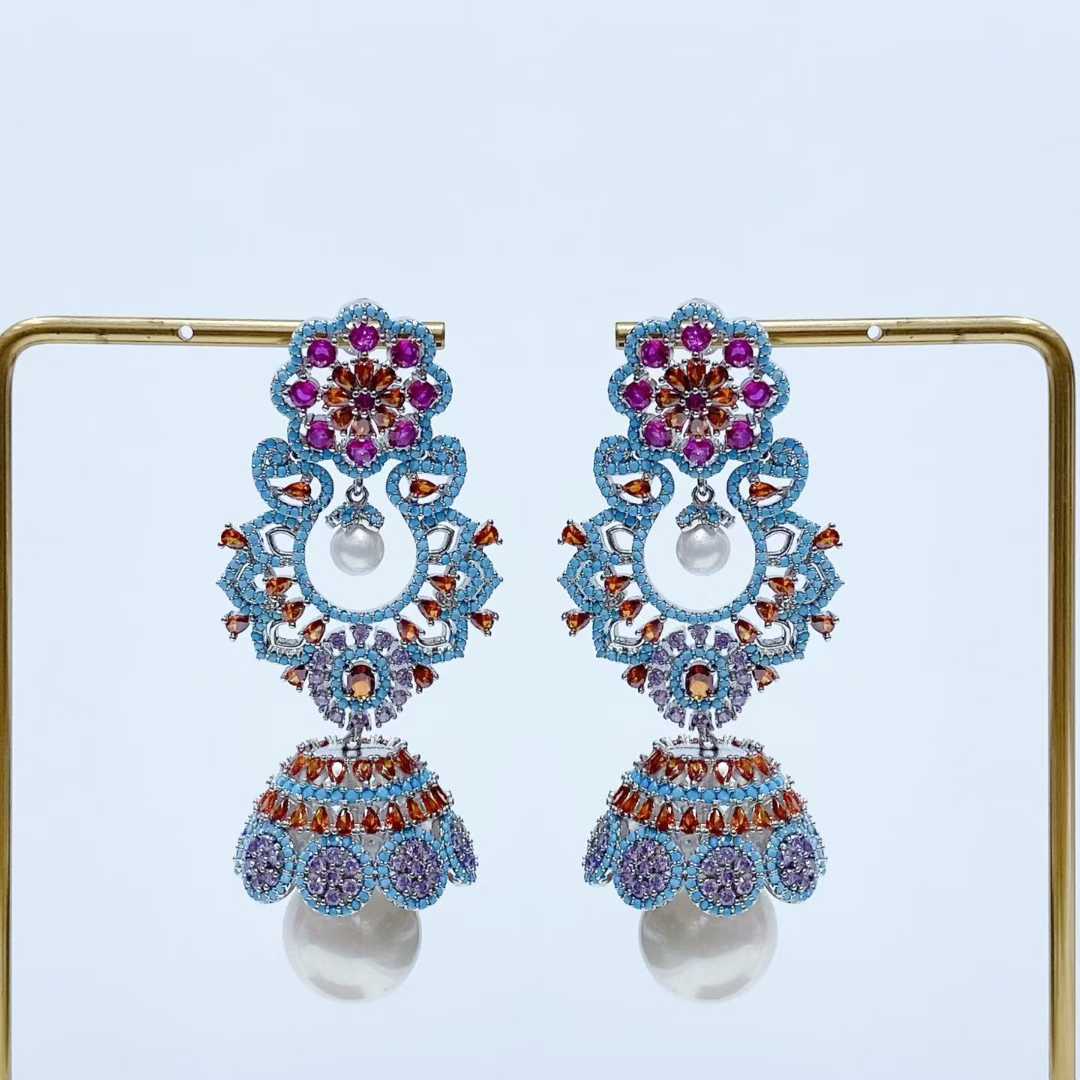 Ethnic light luxury silver needle earrings