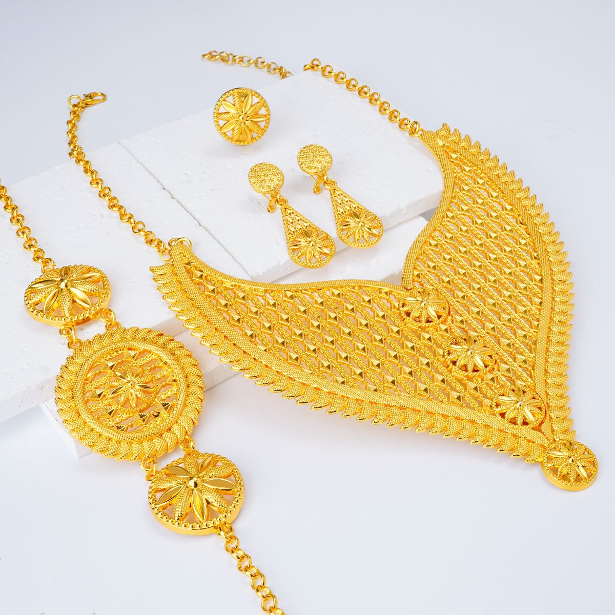 Gold-plated four-piece suit