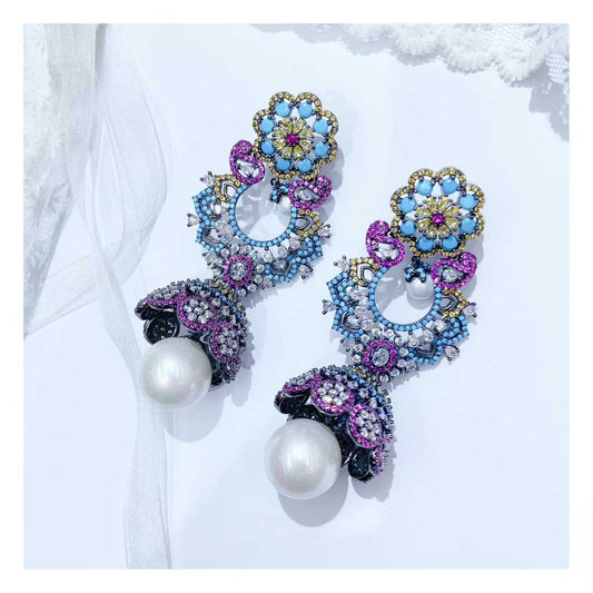 Ethnic light luxury silver needle earrings
