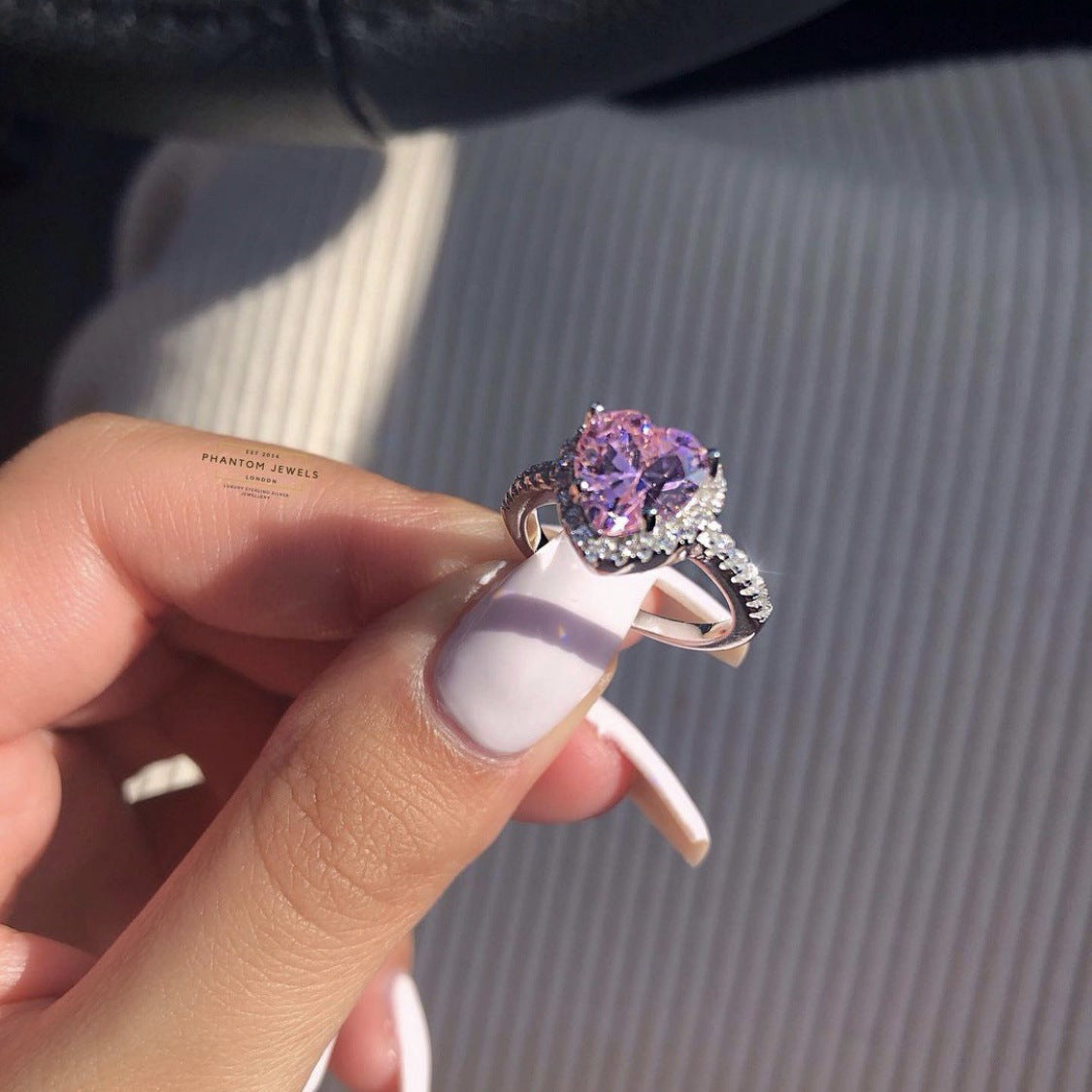 Pink diamond heart-shaped ring