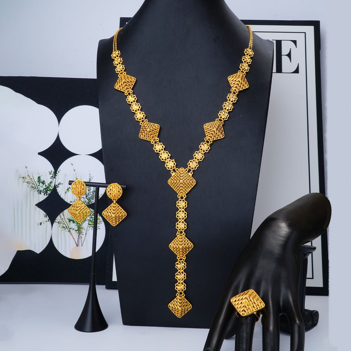 Gold-plated tassel four-piece suit